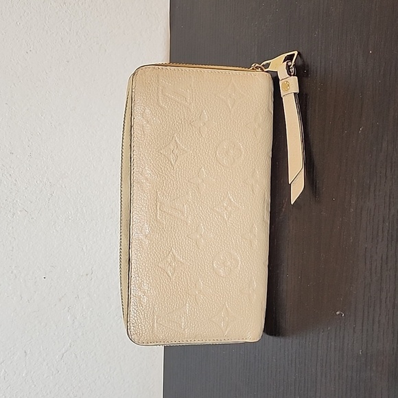 LOUIS VUITTON Round Zipper Monogram Empreinte Leather Beige Zippy Wallet - Picture 1 of 15